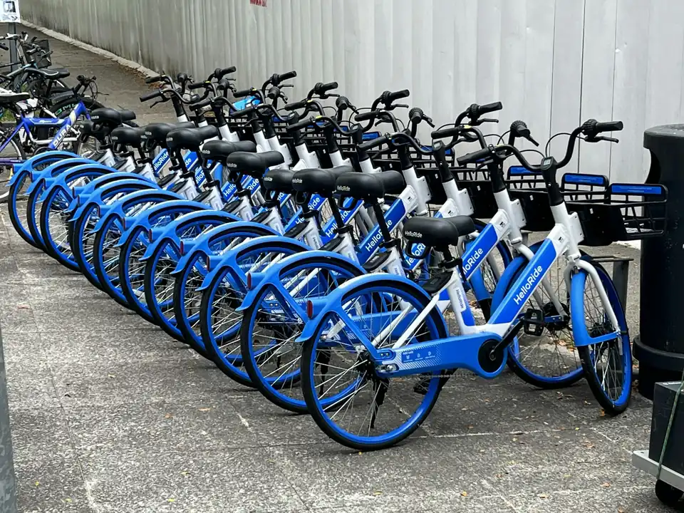 Row of blue shared bicycles