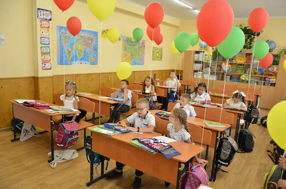 Children at their desks in a primary school classroom