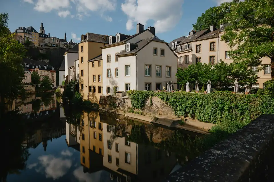 Houses reflected in the Alzette river in the Grund