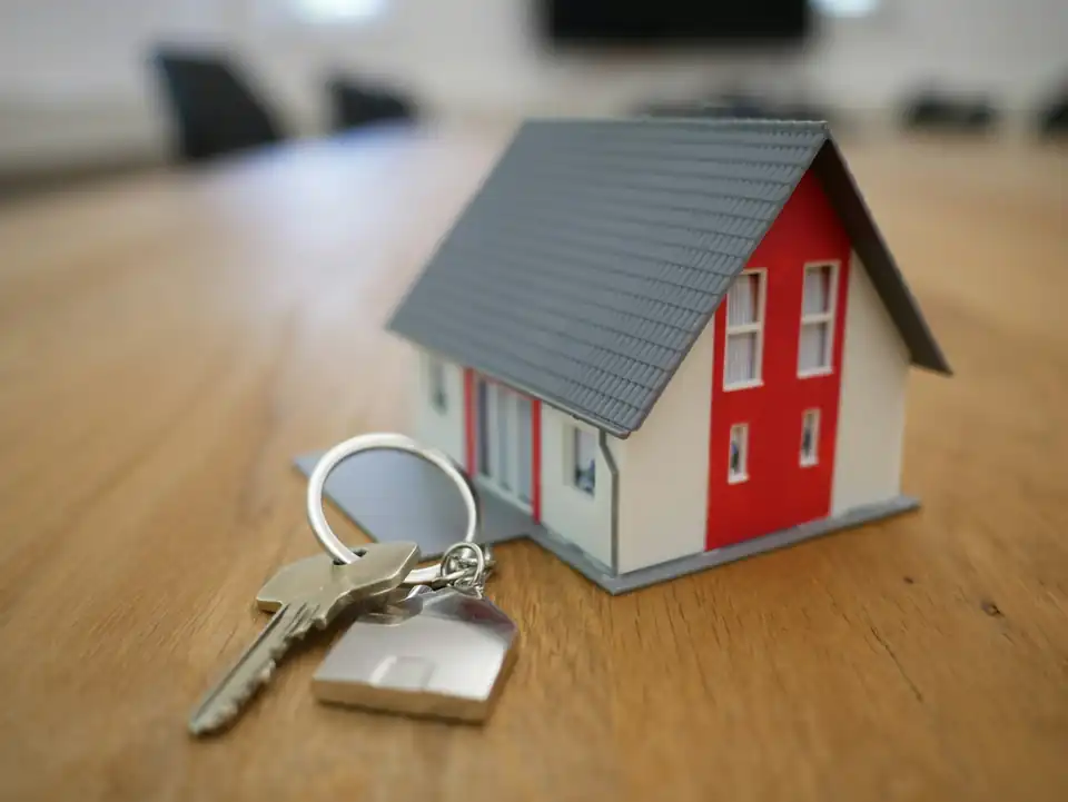 Small model house with a key