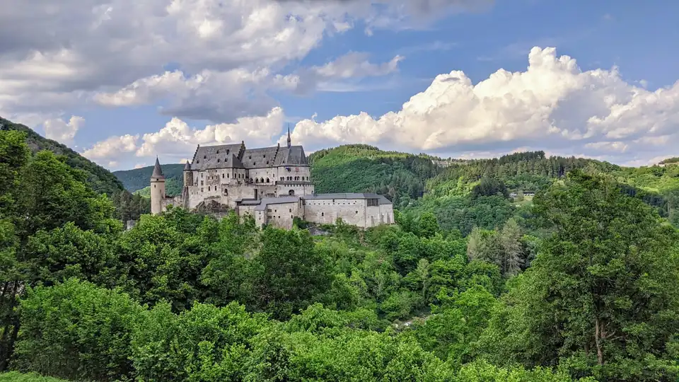 Vianden castle above wooded hills in northern Luxembourg